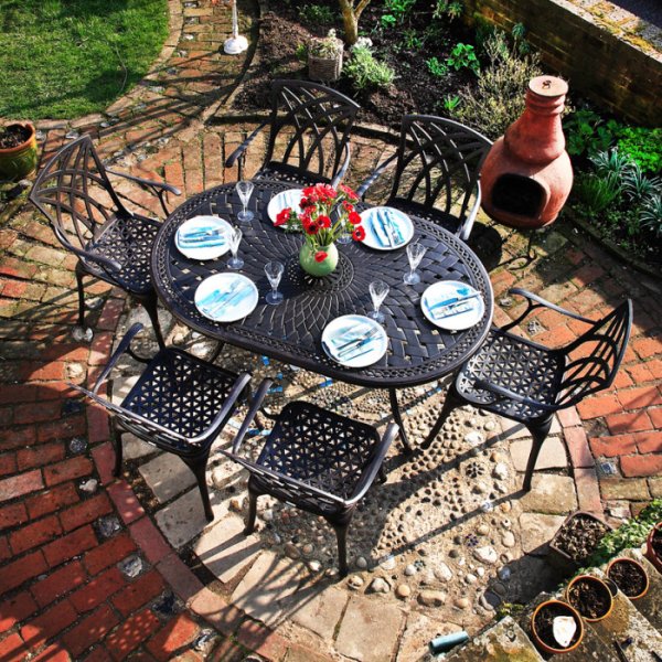 The June 6 seater garden table and chairs in antique bronze